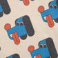 Pattern of blue dogs with red tongues on a beige background