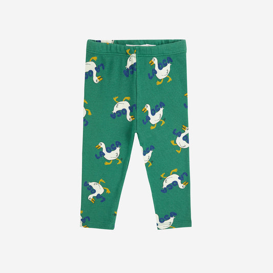 Green leggings with duck pattern on a white background
