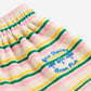 Close-up of a striped fabric with colorful patterns and text on a white background