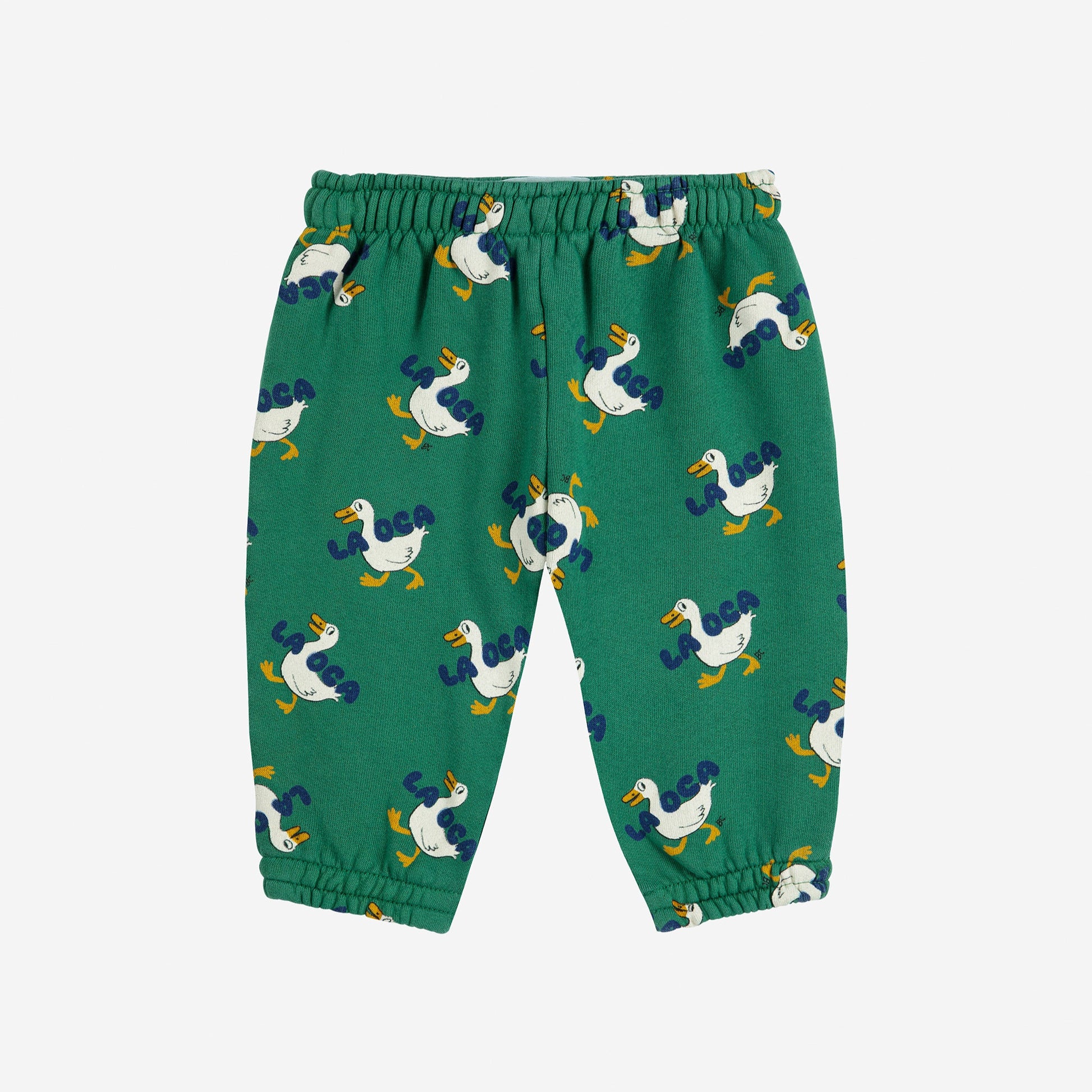 Green children's pants with duck pattern on a white background