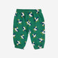 Green children's pants with duck pattern on a white background