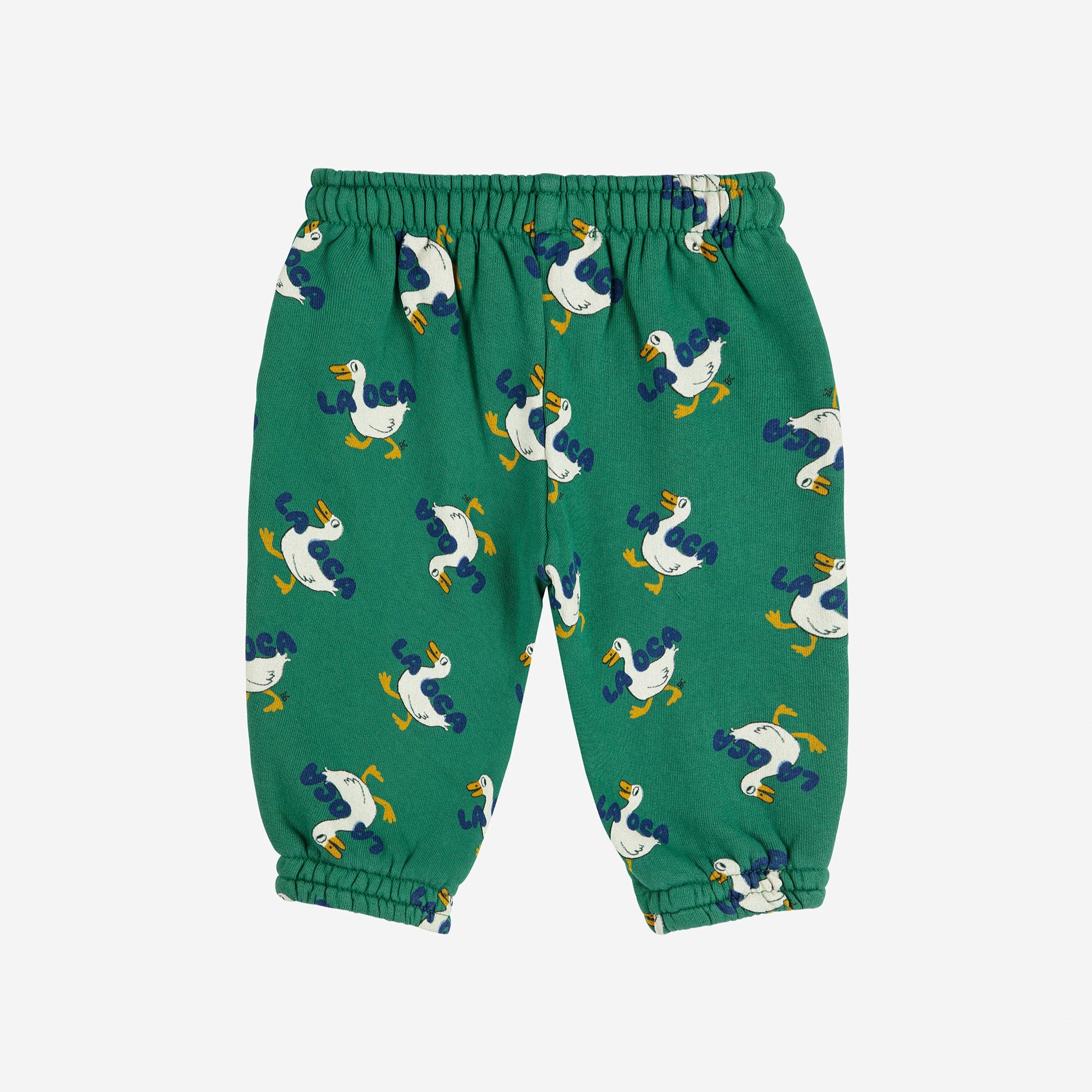 Green children's pants with duck pattern on a white background
