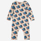 Children's romper with blue dog pattern on a beige background