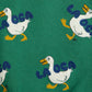 Pattern of cartoon ducks with 'Laoca' text on a green background