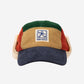 Colorful visor cap with a patch on a white background