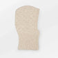 Becksöndergaard Cable Balaclava in Birch White, crafted from a blend of alpaca, wool, and polyamide. The cozy balaclava features an intricate cable knit design and is displayed on a neutral background, highlighting its elegant appearance.