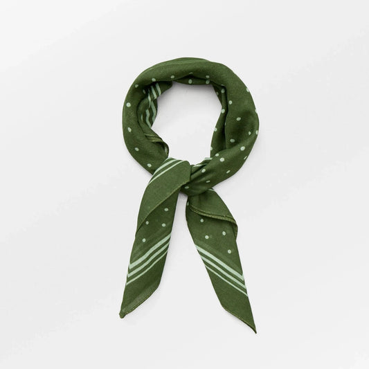 Kombu Green Devi Cotta Scarf by Becksöndergaard, a 55 x 55 cm polka-dotted scarf made of 100% cotton, perfect for styling around the neck, in a ponytail, or as a bag accessory.