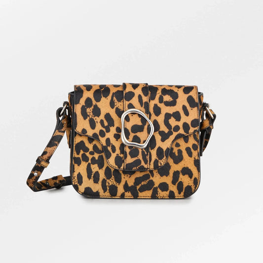 Becksöndergaard Leopa Leather Iris Buckle Bag featuring a bold leopard print on 100% cow leather with natural fur, a sculptural silver buckle detail, a flap closure, and an adjustable leopard-print strap.