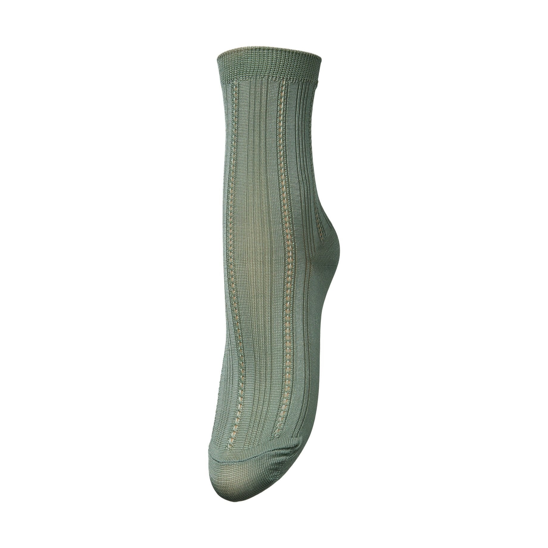 Becksöndergaard Drake Socks in mistletoe green with a glitter design, showcasing their soft cotton blend and stylish appearance.