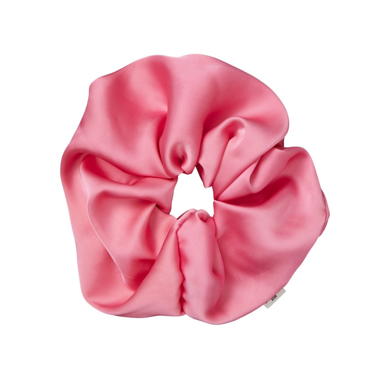 Close-up of the Becks Søndergaard Hot Pink Solid Thick Satin Scrunchie, showcasing its large size, smooth satin texture, and vibrant glossy pink colour.