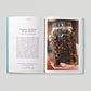 Open book with a photograph of a jar containing preserved specimens on a gray background