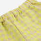 Another close-up of the back of the pants, highlighting the elastic waistband and the texture of the fabric.