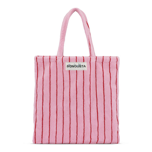 A baby pink and thin neon red striped classic tote bag, made of towelling fabric with a baby pink and thin neon red striped long handle. At the top of the bag it says BONGUSTA in black inside of a cream box with green and lilac flowers coming off the words bongusta. 