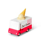 Toy ice cream truck with a cone on top against a white background