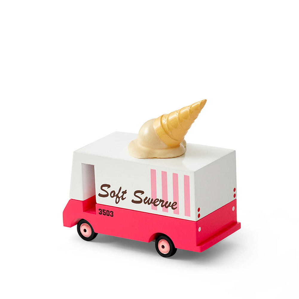 Toy ice cream truck with a cone on top against a white background