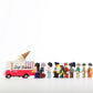 Small toy ice cream truck with a line of diverse figurines on a white background