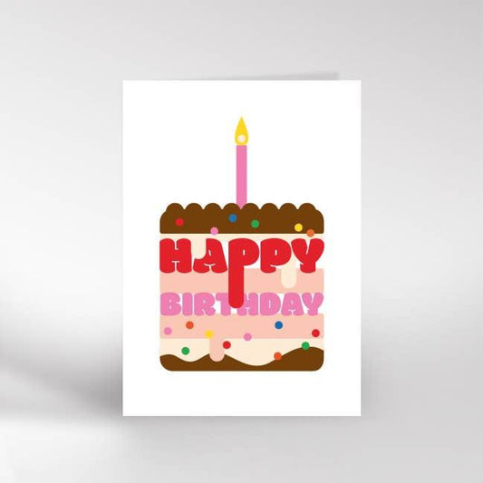 An A6 greeting card with the image of a brown cake with multicoloured sprinkles and a pink candle. The layers of the cake say happy birthday in pink and red writing 