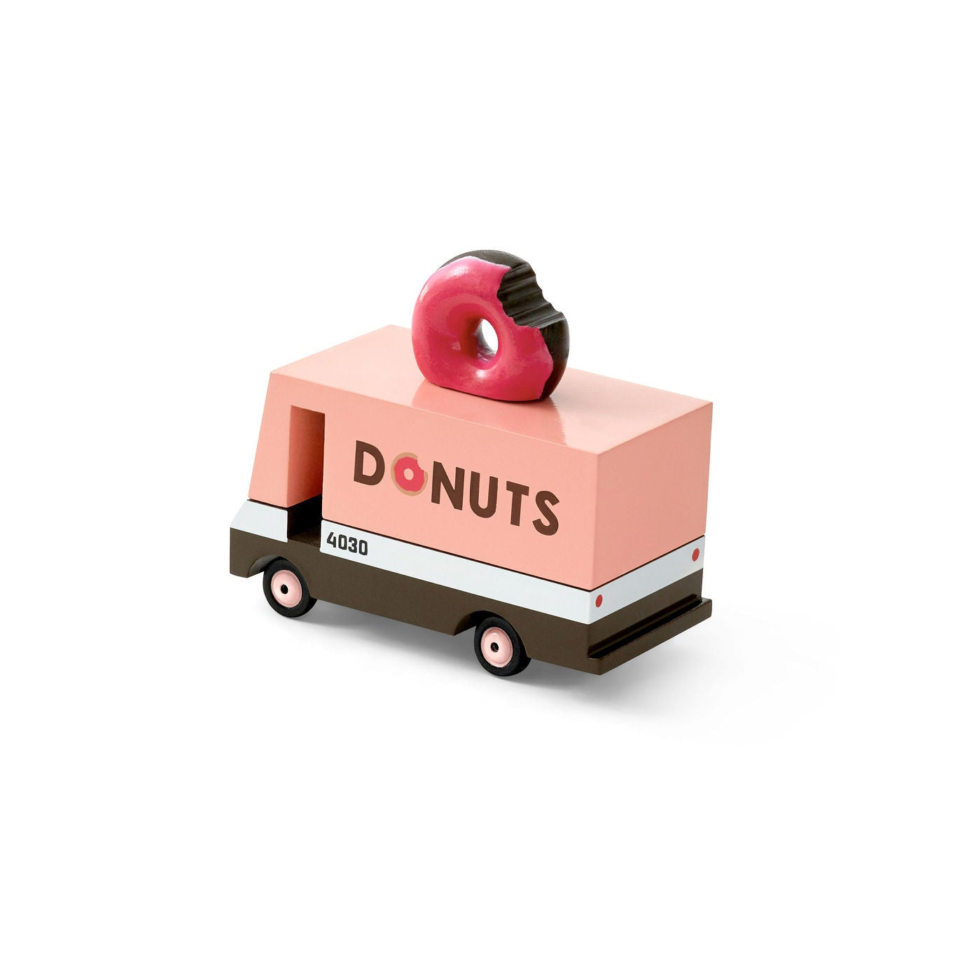 Toy donut truck with a pink body and red donut on top against a white background