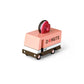 Toy donut truck with a heart-shaped donut on a white background
