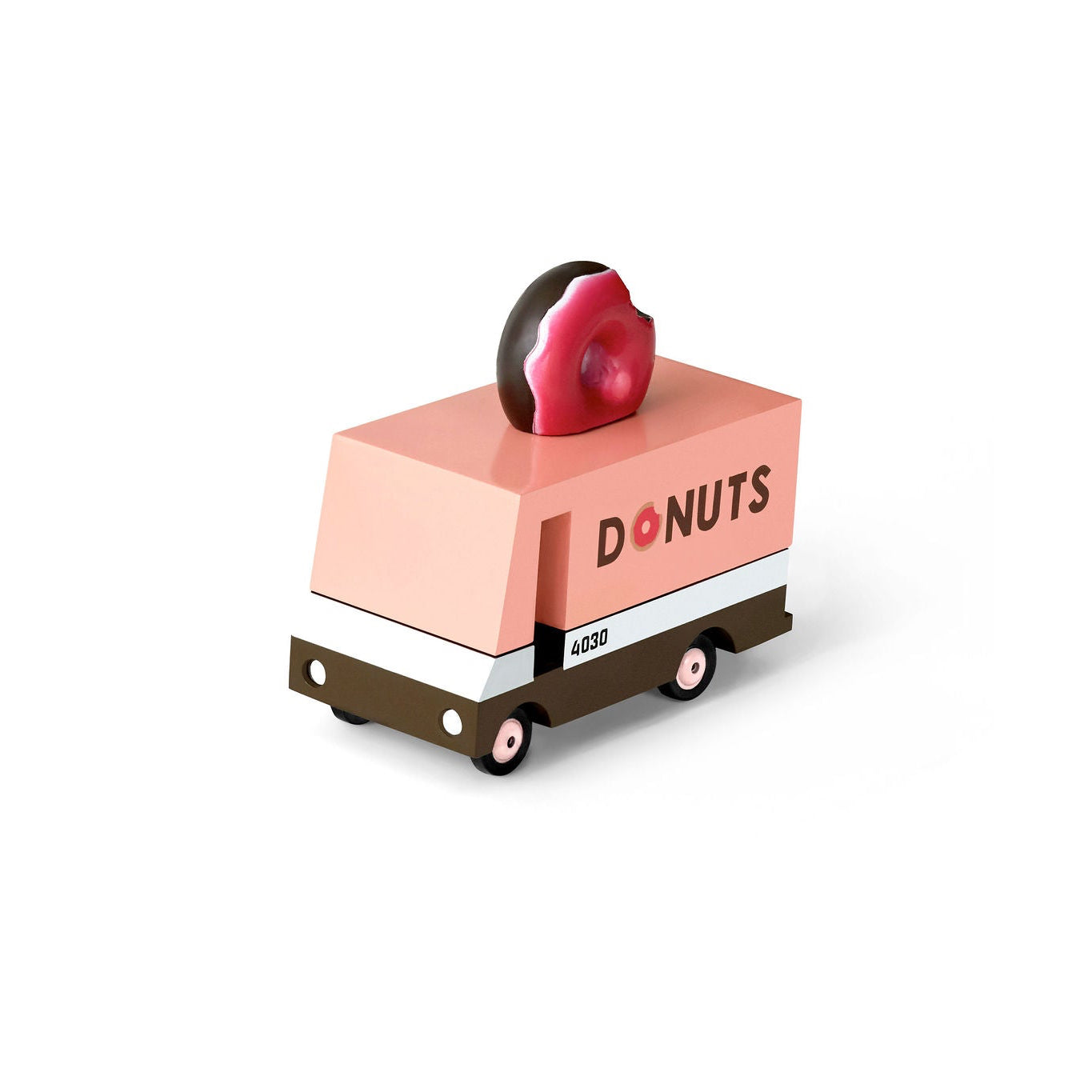 Toy donut truck with a heart-shaped donut on a white background