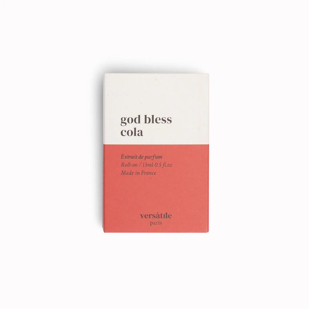 Perfume box with 'god bless cola' text on a white background