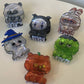 A selection of acrylic hair clips in various shapes for Halloween, for example a pumpkin bear, witch cat, and Mummy rabbit