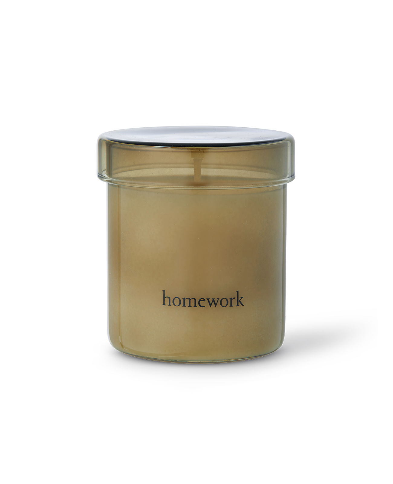 Homework Earth candle, in a translucent green glass with a lid. Branding of homework spelt in lowercase small font long the bottom