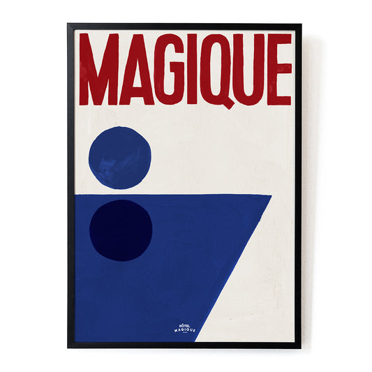 This A3 Hotel Magique print titled 'A Splash Of Magique' features a white background, a royal blue circle, a navy blue circle and a royal blue triangular shape. The text "Magique" is written in deep red. "Hotel Magique" is written in white in a small font. The print frame is black.