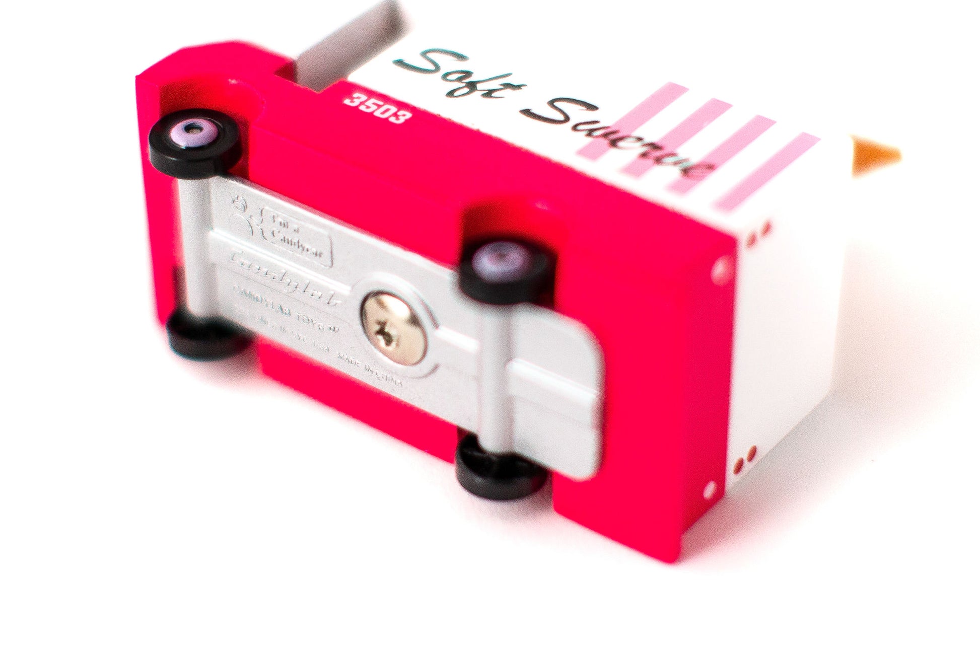 Pink and white mechanical device with 'Soft Subdue' branding on a white background