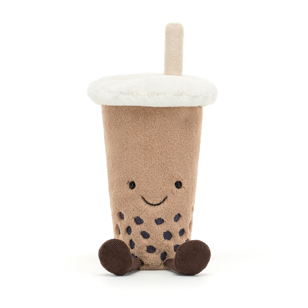 Soft Jellycat Amuseable Bubble Tea plush toy with a smiley face, fuzzy straw, corduroy legs, and velvety boba balls in a beige cup.