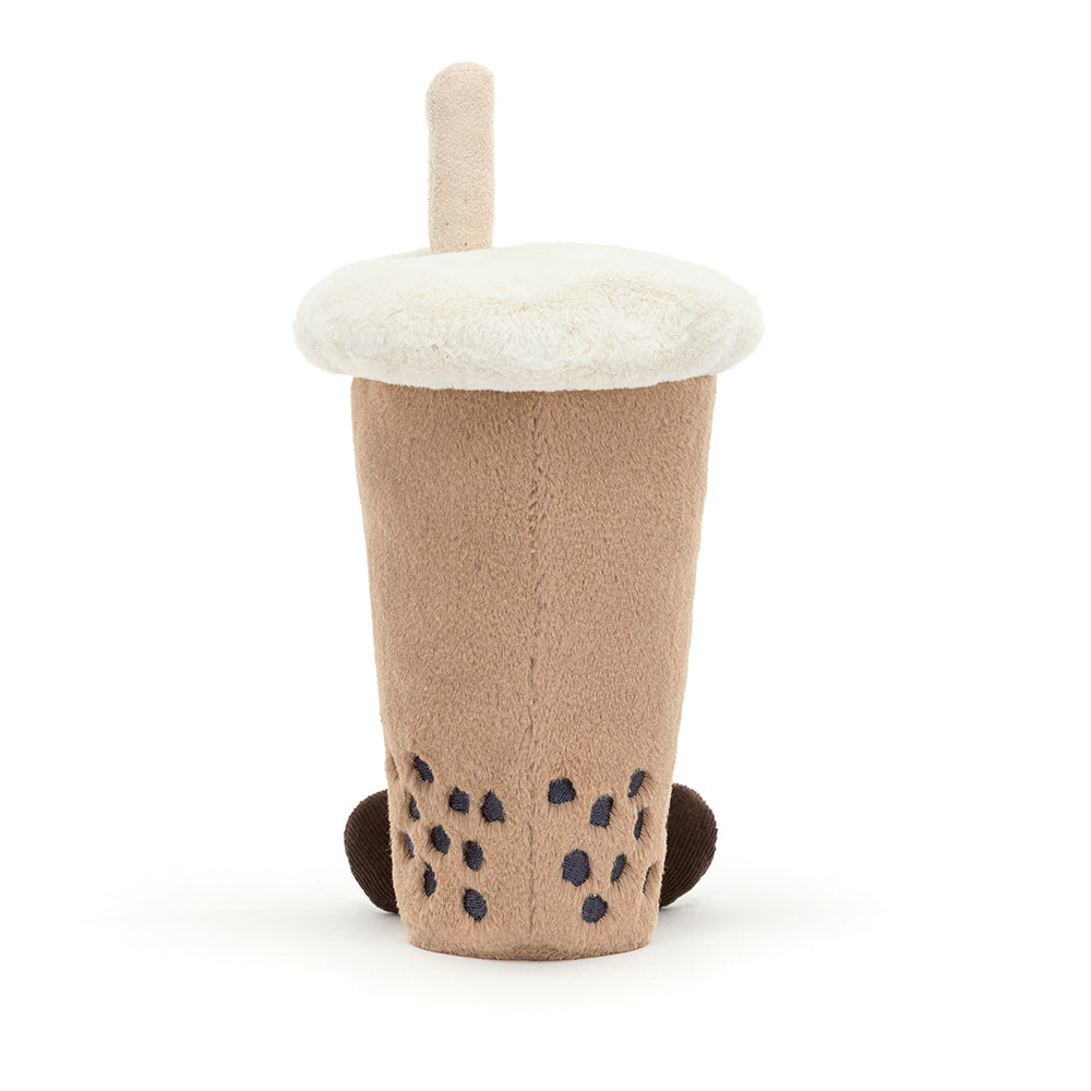 Soft Jellycat Amuseable Bubble Tea plush toy with a smiley face, fuzzy straw, corduroy legs, and velvety boba balls in a beige cup. Shown from the back