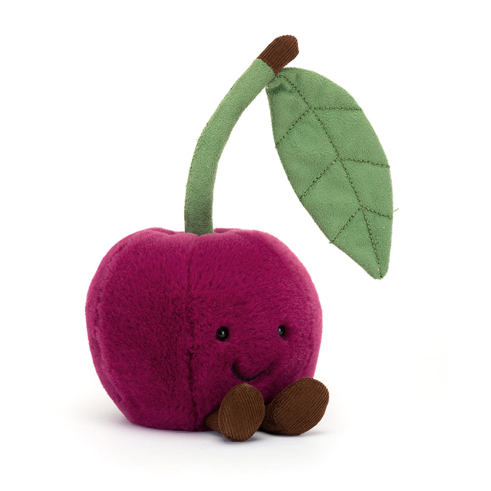 A soft, plush toy featuring two rosy cherries with smiling faces, connected by a green stem. The Jellycat Amusables Cherry Please is designed for cuddling and play, showcasing vibrant colors and a charming expression. Perfect for children and collectors, this delightful plush adds a fun, fruity touch to any collection. Shown from a side angle