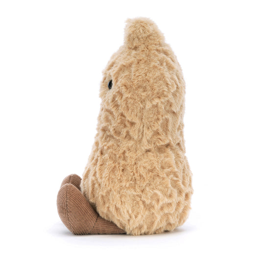 Jellycat Amuseables Peanut plush with a soft beige shell, tubby tummy, cheerful smile, milk chocolate boots, and a tousled tuft on top. Shown from the side