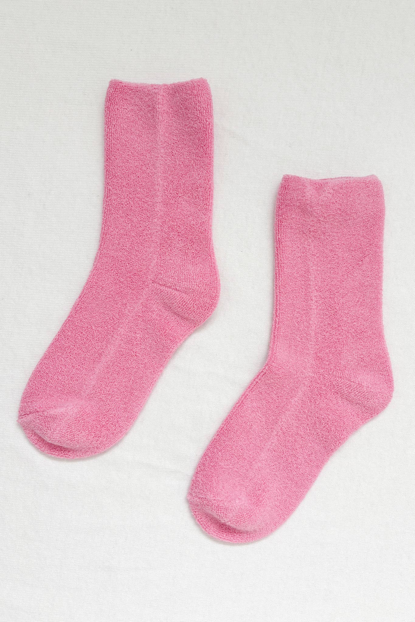 a pair of bubble gum pink thick ankle socks