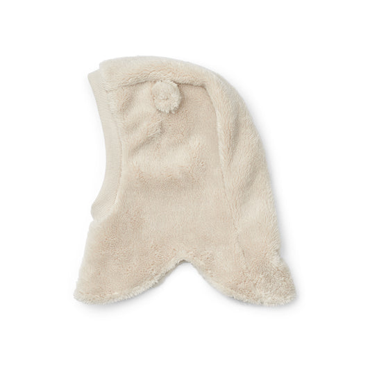 Liewood Giri Balaclava in soft teddy fabric, featuring ear details, a ribbed hem around the head opening, and a small bunny embroidery, displayed on a neutral background.