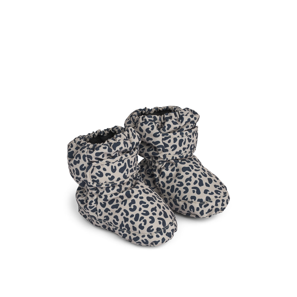 Liewood Heather Baby Footies in Mini Leo/Mist, featuring a soft fleece lining, water-repellent and windproof material, Velcro ankle closure, and non-slip soles, displayed on a neutral background.