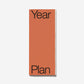 Orange planner with 'Year Plan' text on a white background