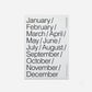 White poster with black text listing months of the year on a white background