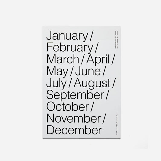 White poster with black text listing months of the year on a white background