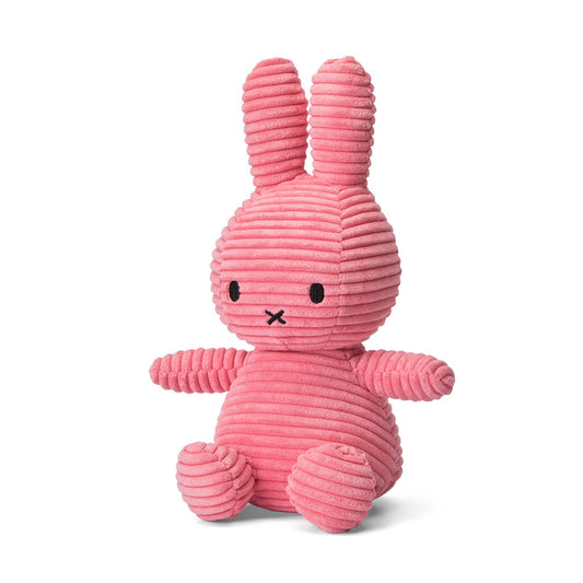 A Miffy Corduroy Bubblegum soft toy in the colour pink. This Miffy has black eyes and nose. It is 23 cm in height. The background is white. 