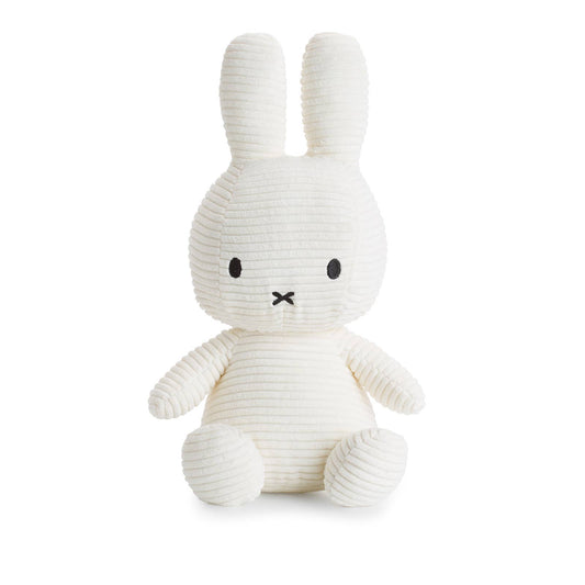 A Miffy Corduroy soft toy in the colour soft white. This Miffy has black eyes and nose. It is 33 cm in height. The background is white.