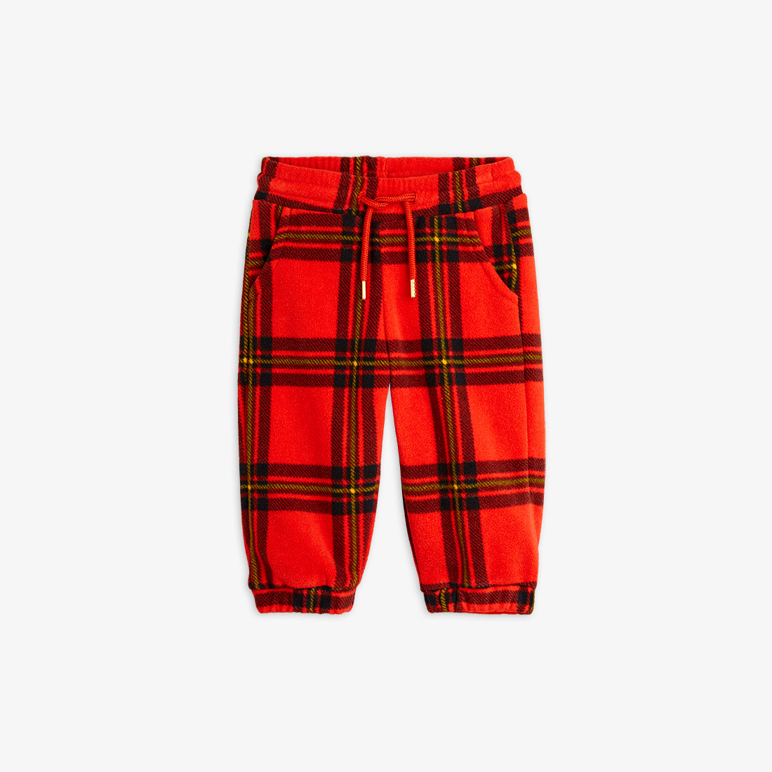 a Mini Rodini childrens bright red with large check pattern fleece trousers, with an elasticated draw string waistband and two side pockets and elasticated cuffs at the ankles