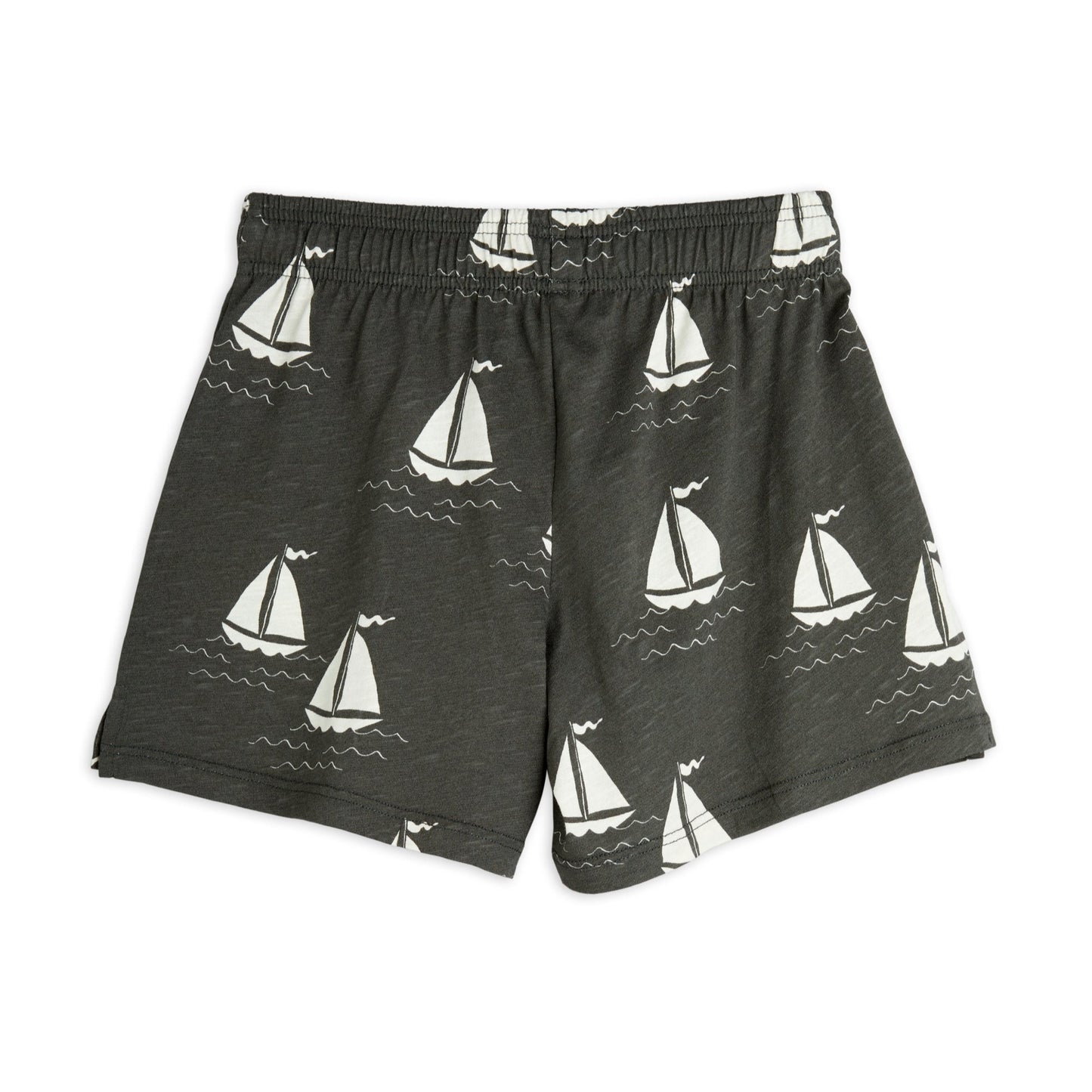 Back view of the Mini Rodini dark grey shorts, featuring an all-over white sailboat print, elasticated waistband, and a casual fit.