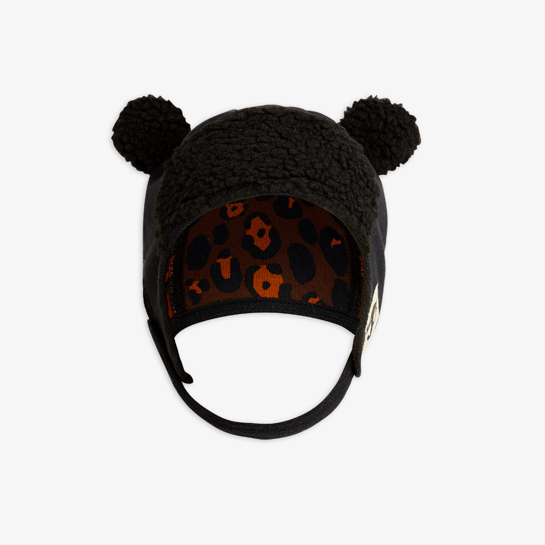 Close-up of the Mini Rodini baby cap, featuring fluffy ears on top and a leopard-print lining. Made from 100% recycled polyester, the cap includes a practical chin strap and a sewn-on Mini Rodini Panther label on the side.