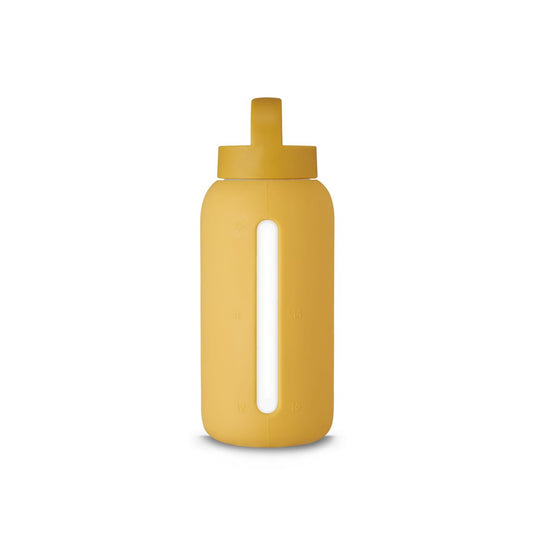 Muuki refillable borosilicate glass water bottle, ideal for water, tea, and herbal infusions, promoting sustainable hydration. In honey mustard yellow colourway 