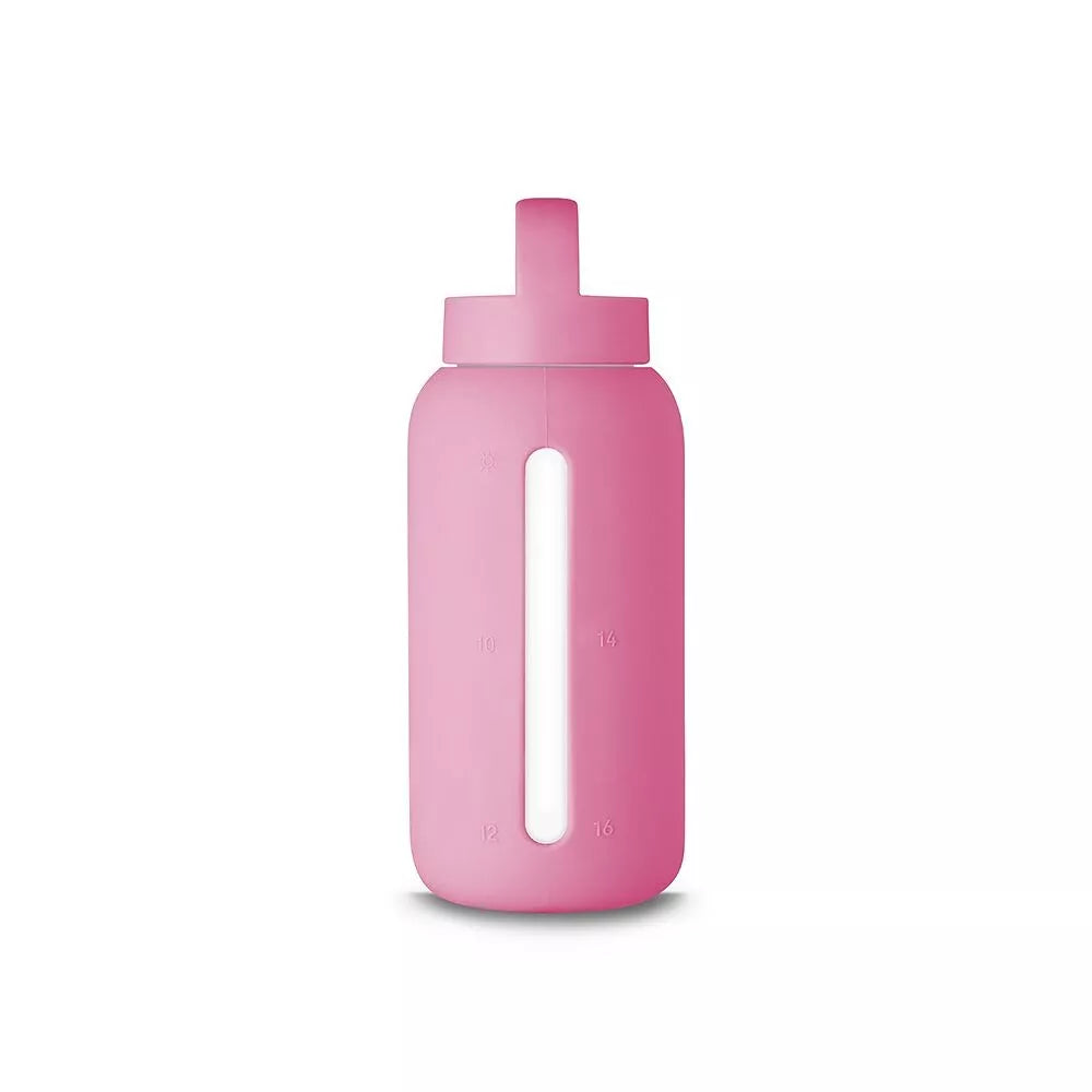 A matte Silicone covered glass bottle, with a window to see the drink on the inside, in a bright pink colour with a plastic screw top circular lid with a handle