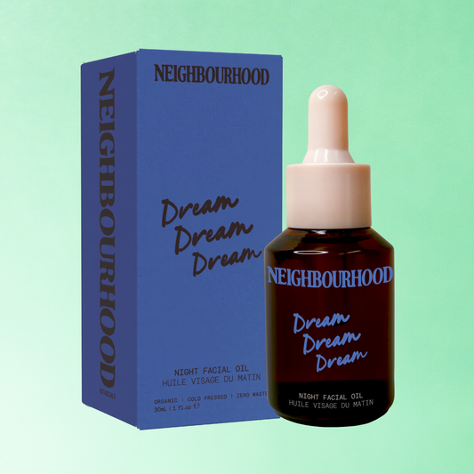A bottle and box of potent overnight skin cocoon oil, featuring minimalist, natural-toned packaging with a focus on its premium, organic ingredients.