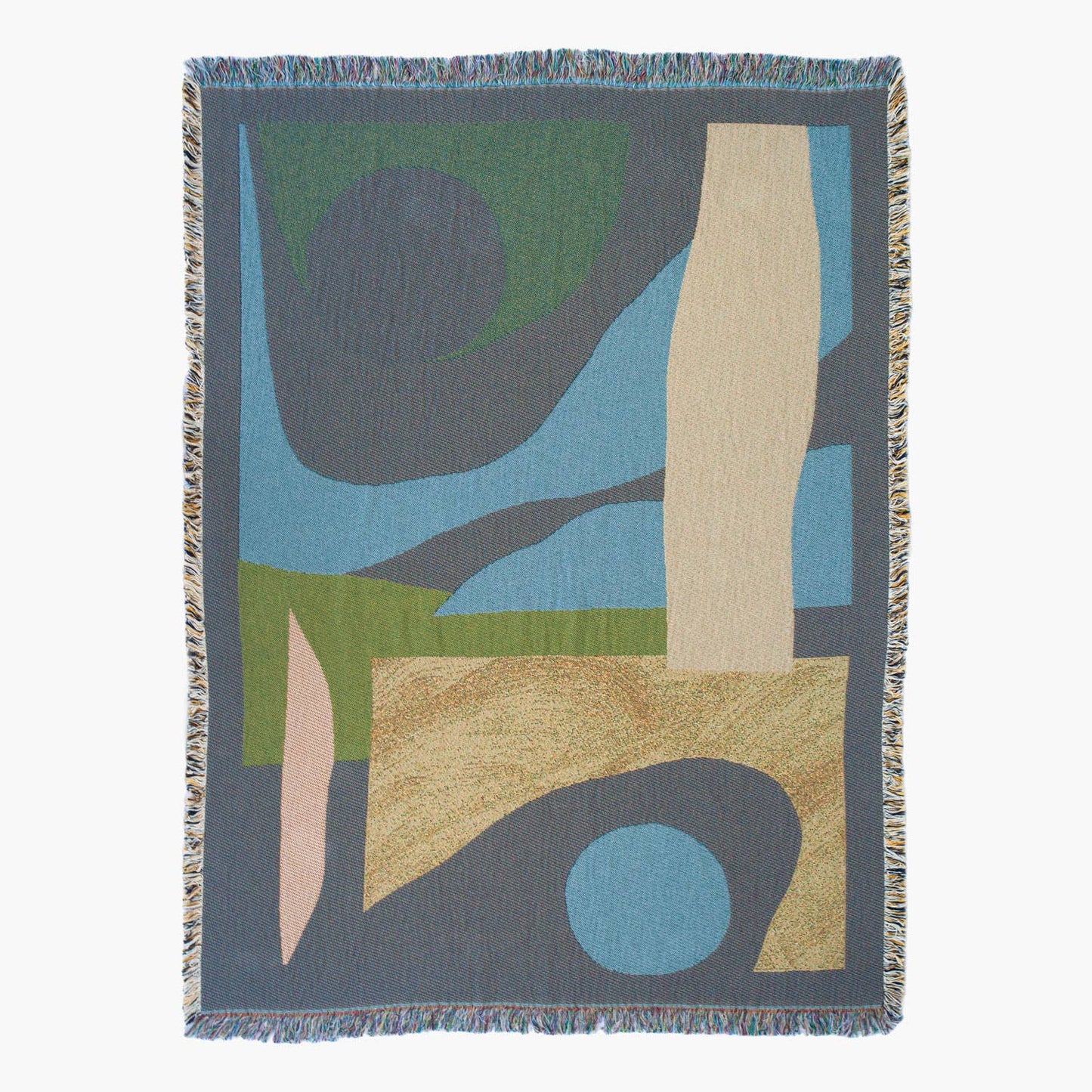 The reverse side of the Essien Throw, showing the muted, earthy-toned colourway with a mix of blue, green, and beige. The woven texture adds depth and warmth.