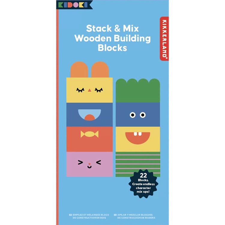 "Stack & Mix Wooden Building Blocks toy set packaging. The box has a blue background and features colorful, illustrated wooden blocks stacked to create mix-and-match characters with playful facial expressions. A label highlights '22 Blocks. Create endless character mix-ups!' The Kidoki and Kikkerland logos are present, along with multilingual product descriptions.