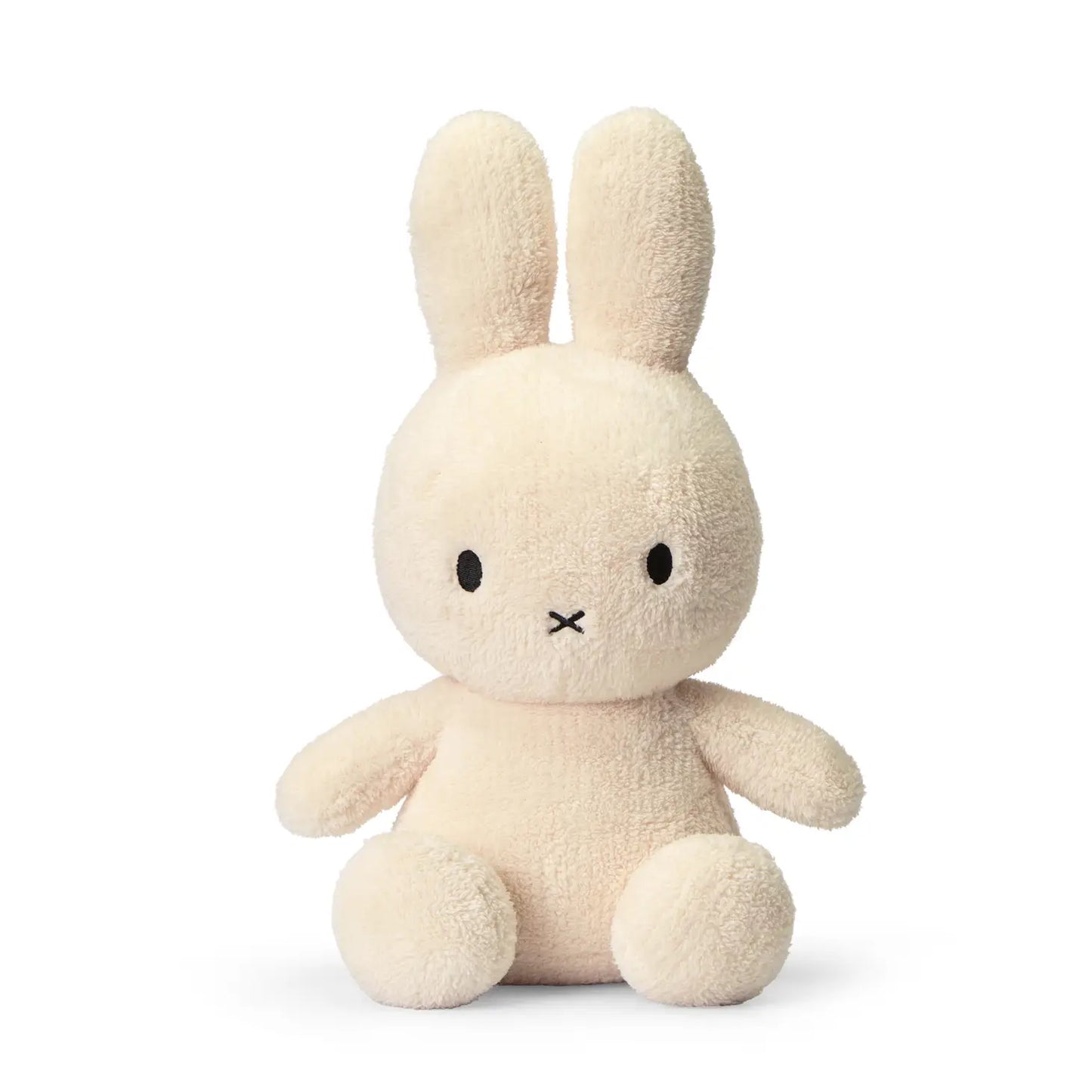 A Miffy Cream terry soft toy in the colour cream. This Miffy has black eyes and nose. It is 33 cm in height. It is made with 100% recycled filling